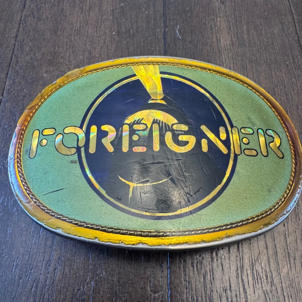 Vintage Foreigner Band Belt Buckle 1978 Oval Metal Rock Music Collectible‎